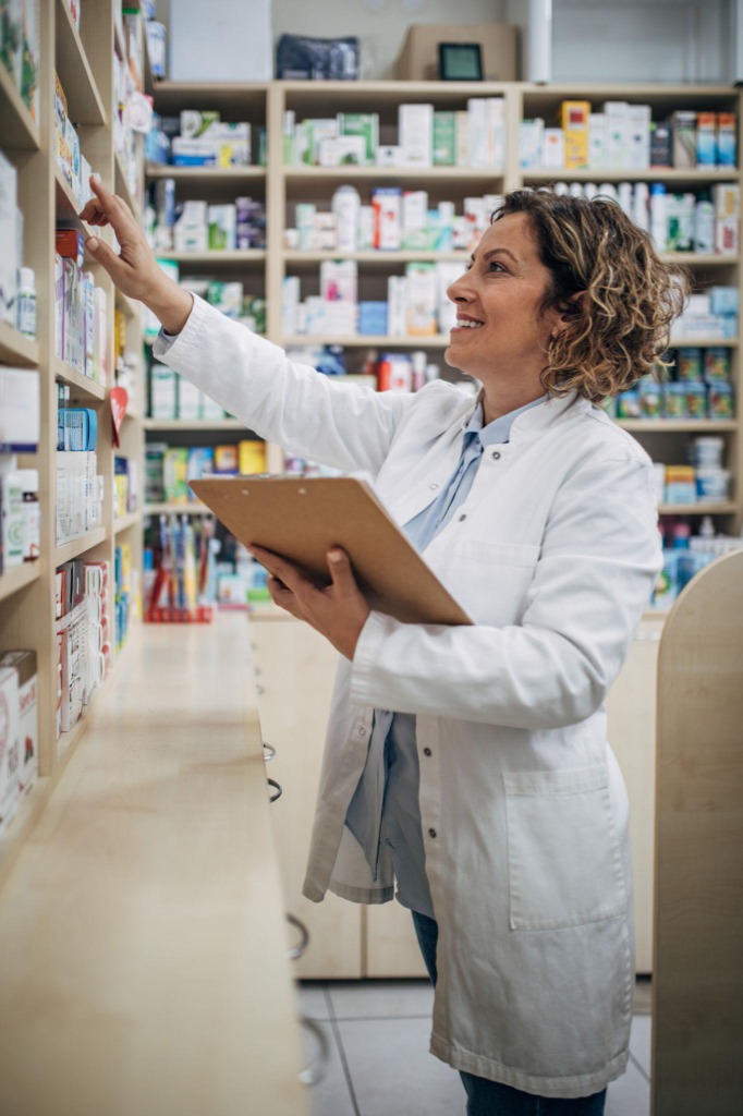Compliance auditor verifying temperature-controlled generic drug storage in Eatontown, New Jersey