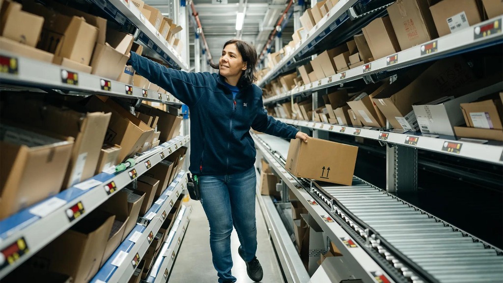 Logistics staff managing pharmaceutical inventory at the Eatontown, NJ warehouse facility